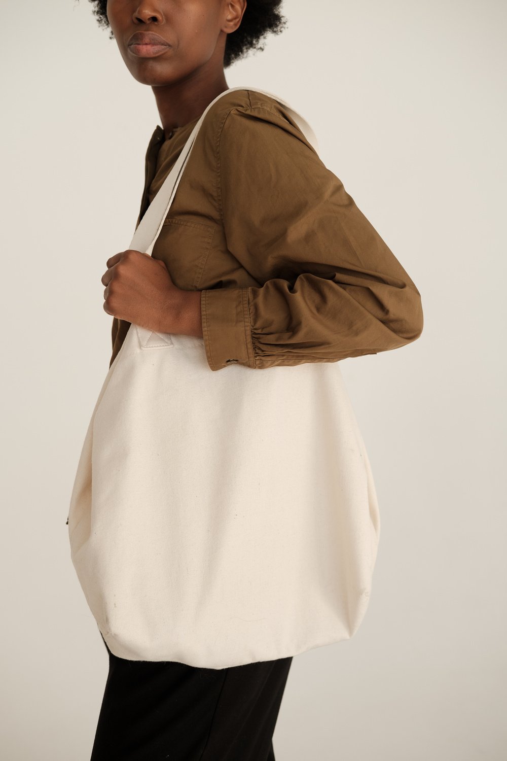 Woman in Dress Shirt with Tote Bag